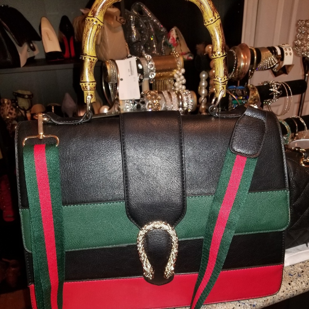 Beautiful black bag with bamboo like handle